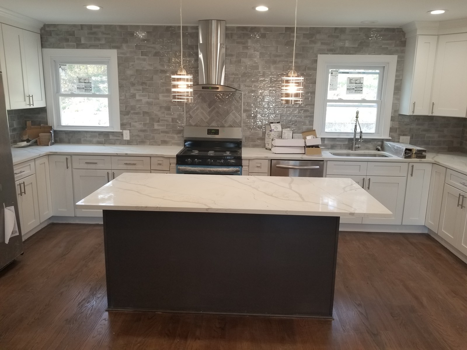 White shaker kitchen with quartz countertops